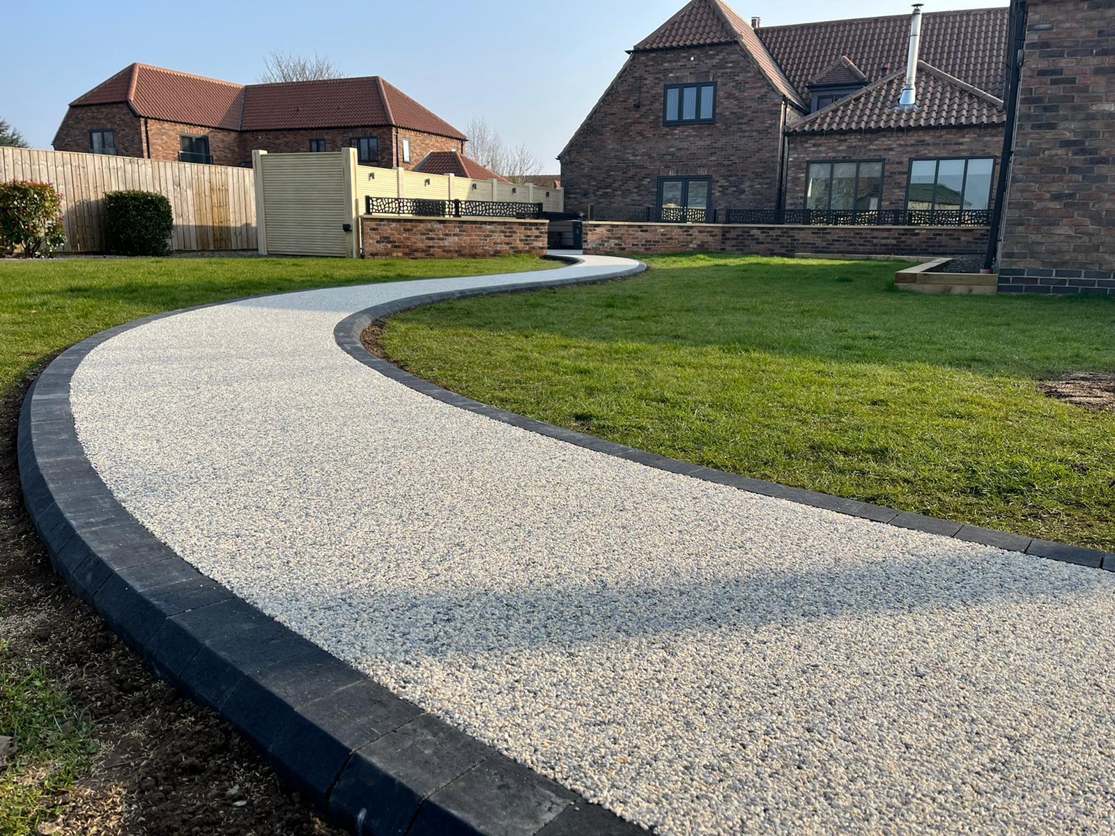 Curved resin garden pathway