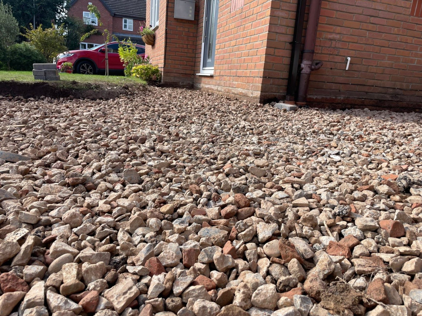 Stone sub-base laid before surfacing